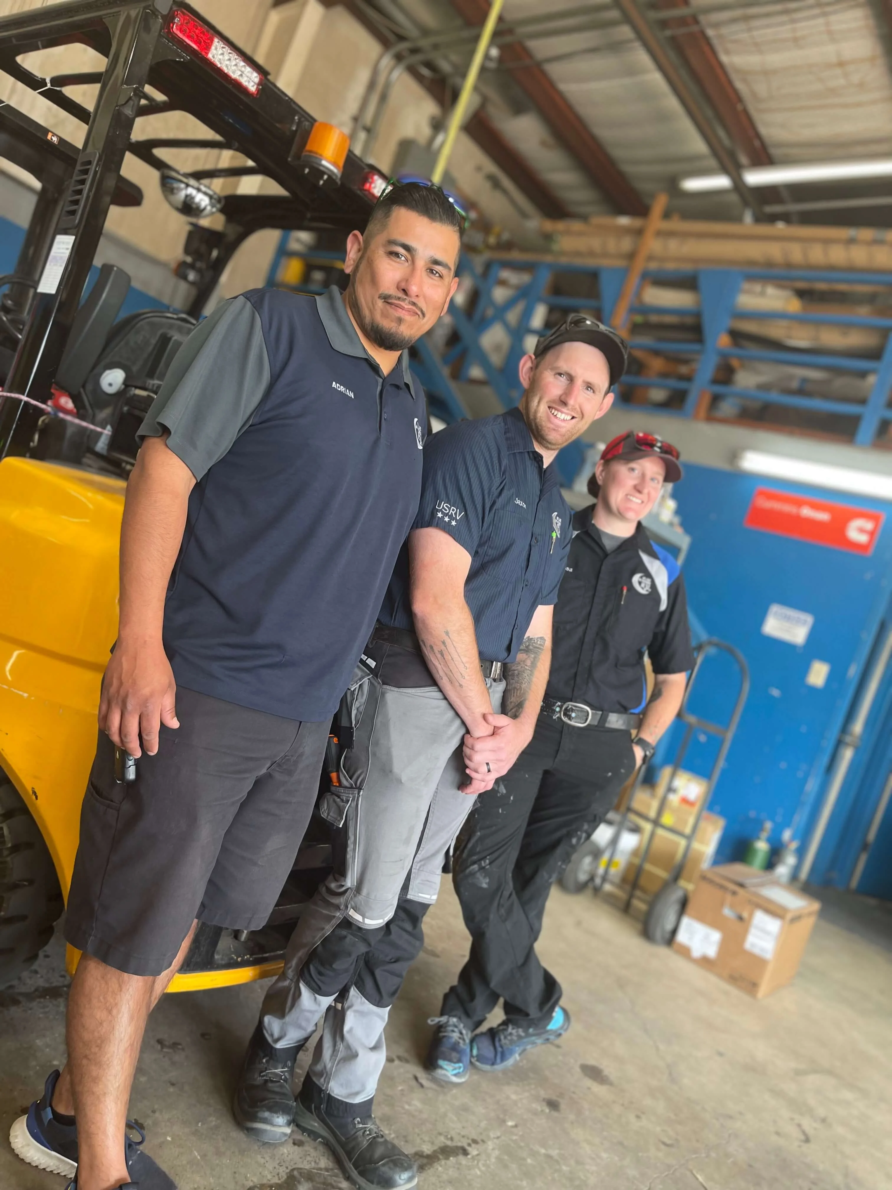 Blue Moon technicians Adrian, Jaxon, and Anissa